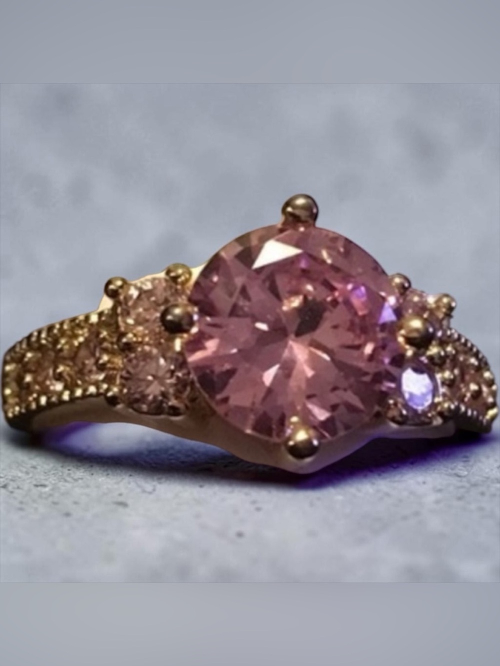 Woman’s Pink sapphire ring Gold Tone size 8